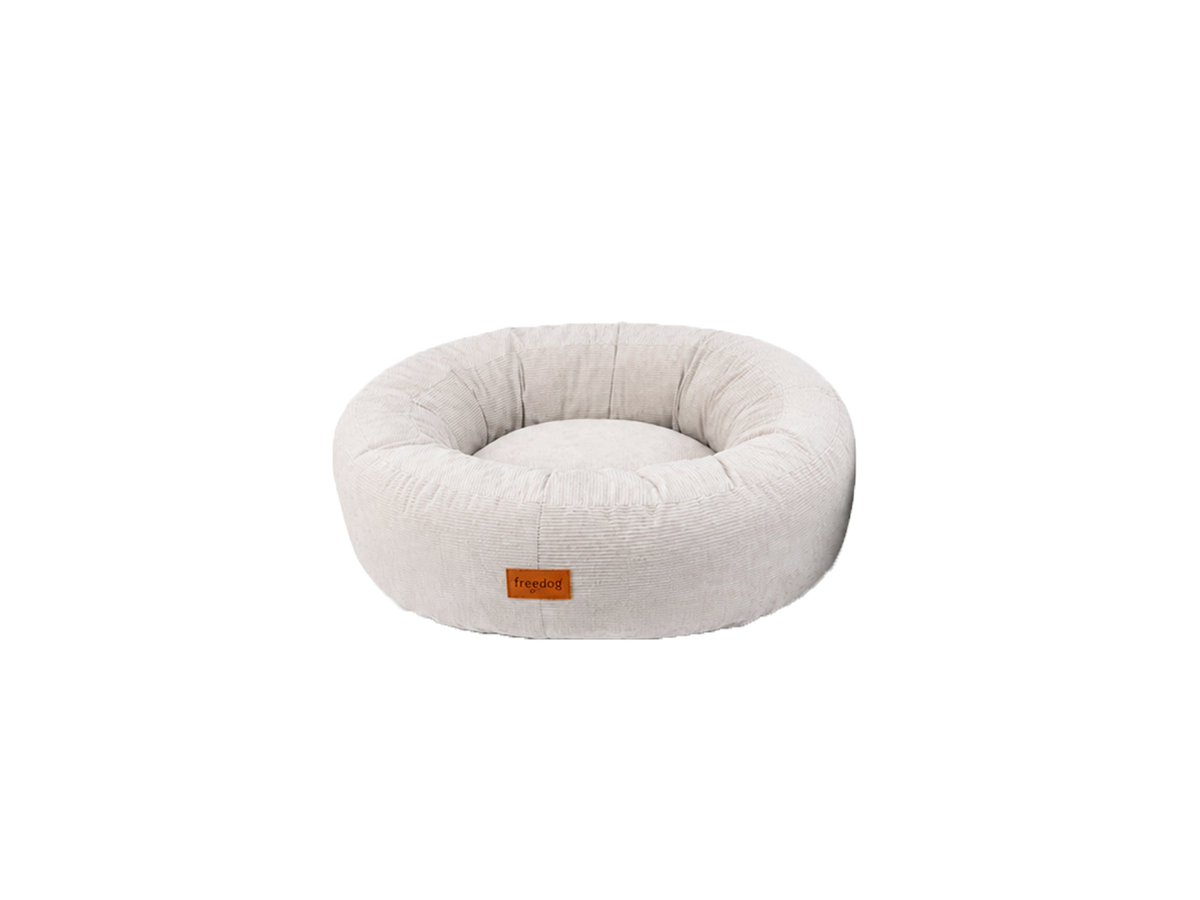 Detalle del tejido suave de la cama Cuddle Nest Freedog