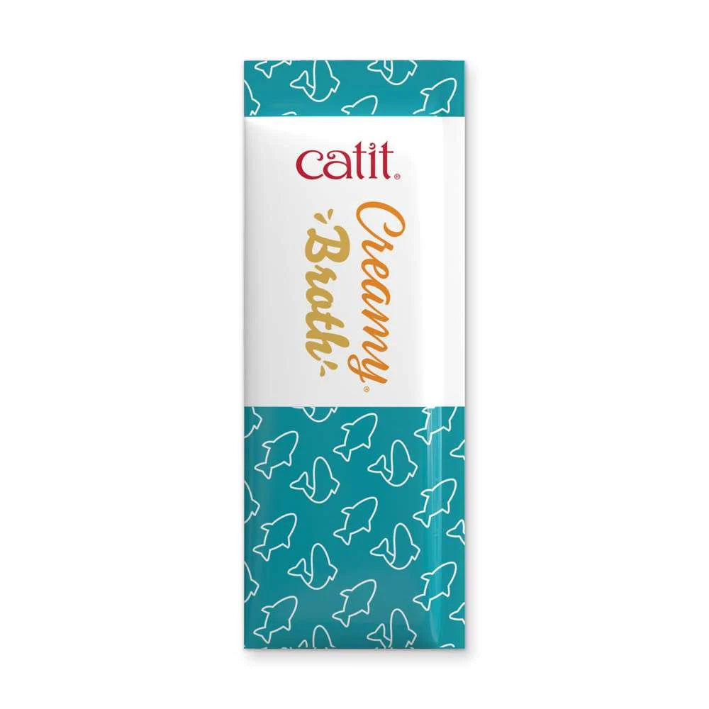Cuenco de Catit Creamy Broth Atún y Salmón junto a atún, salmón y tomates