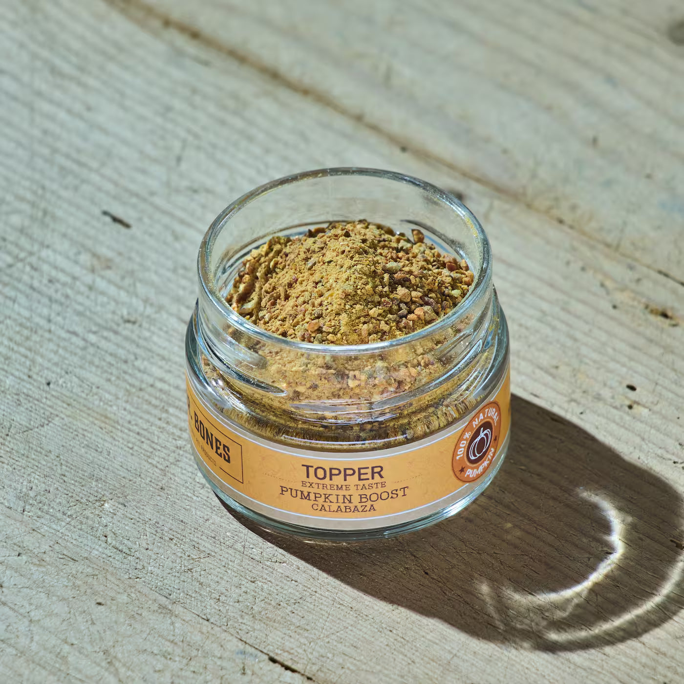 Topper de calabaza mezclado con pienso y comida húmeda para perros y gatos