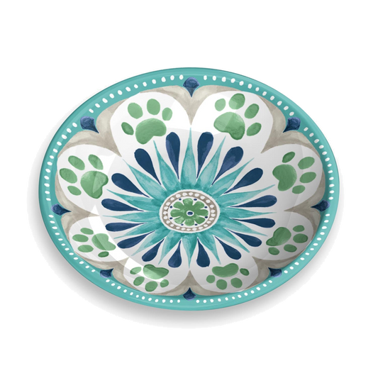 Plato de melamina con diseño floral y huellitas verdes y azules, ideal para gatos y perros pequeños.