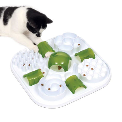puzzle para gatos con snacks y pienso seco